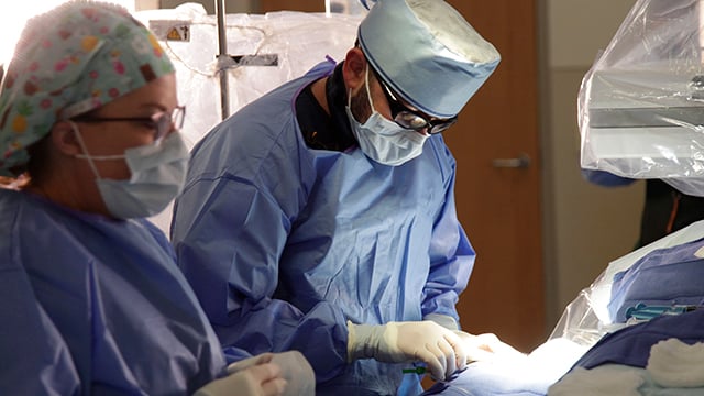 Reid Health's Cardiologist Dr. Feras El-Bash and team preform a cath procedure