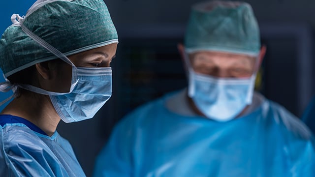 team of surgeons performing the surgical operation