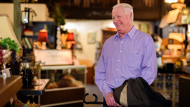 A Reid Health patient who had the Watch device procedure shopping in a store