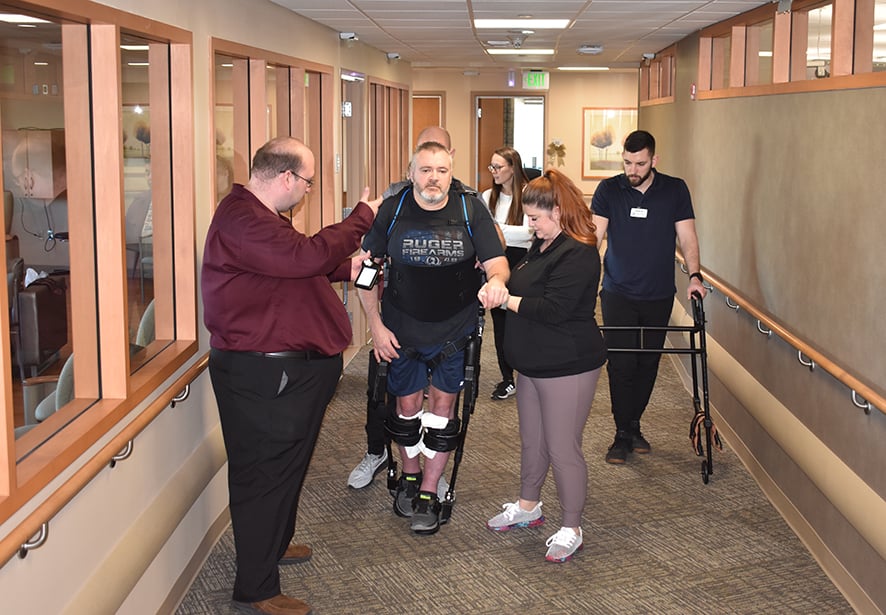 A patient at Reid Health using the Exosekeleton