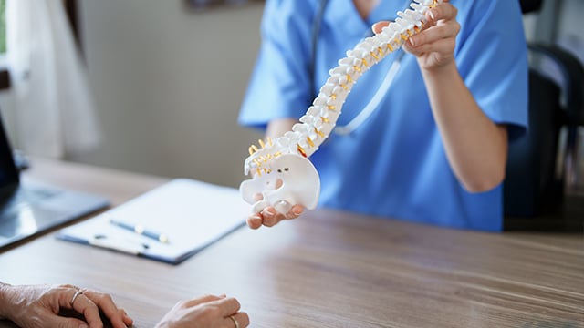 Female doctor talking to an patient