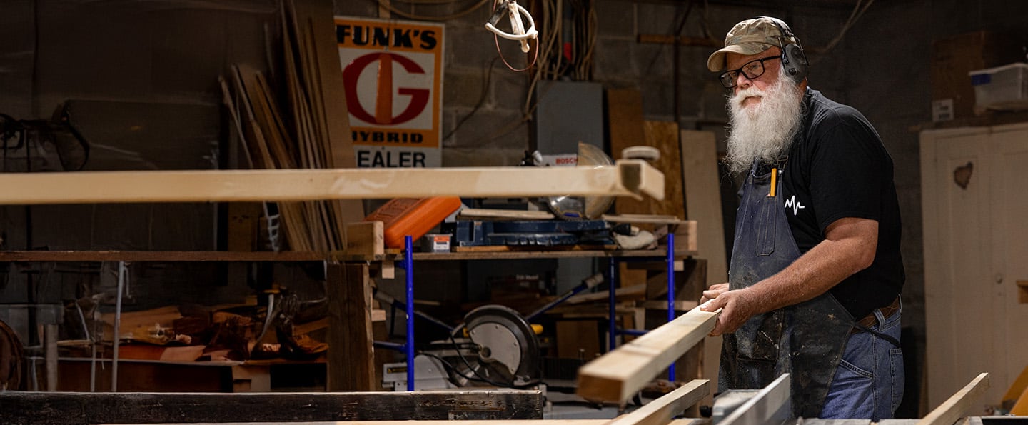 Dave Steinard back in his wood shop after having spine surgery with Dr. Kostuk