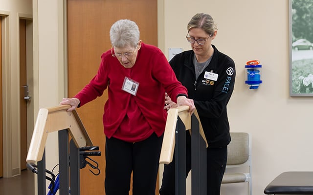 A Reidh Health Physical Therapist working with a PACE participant  