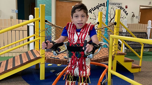 A patient wearing the TheraSuit