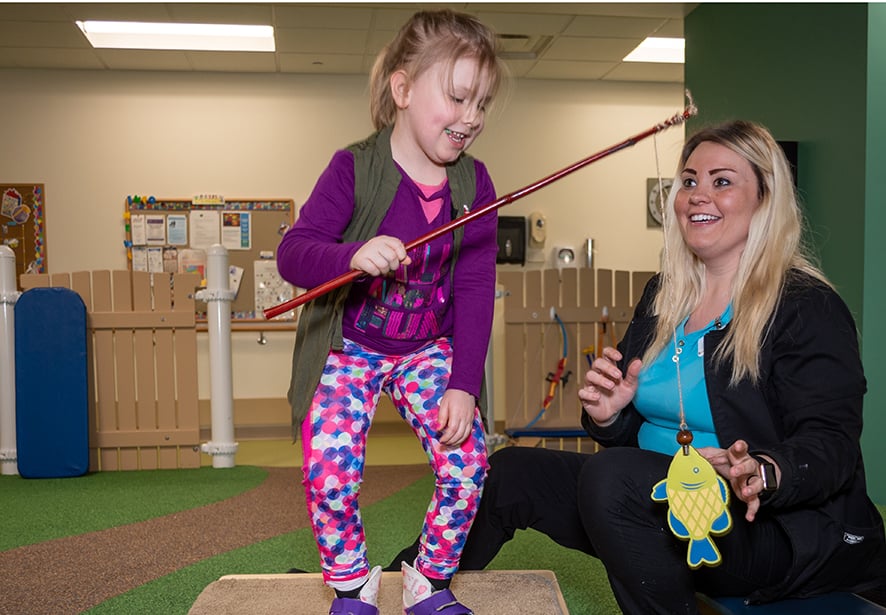 a young girl working on her balance
