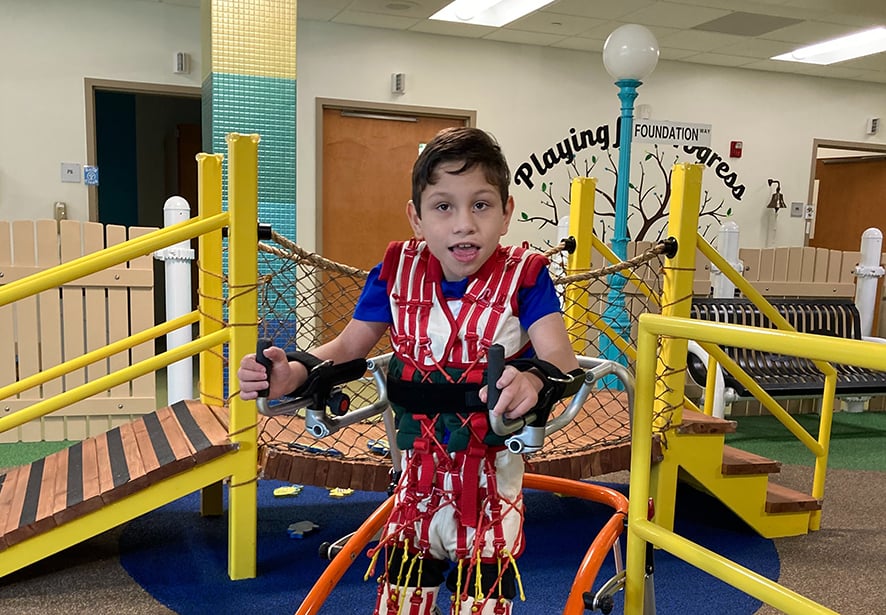 A patient working on his mobility by using a waling device 