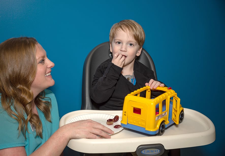 A child participating in therapy session at Reid Pediatric Rehabilitation Services