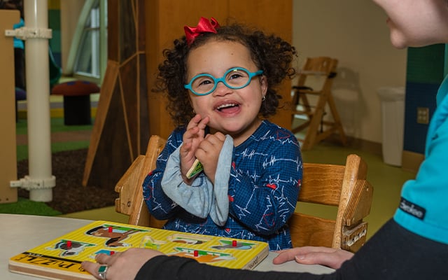 A child participating in therapy session at Reid Pediatric Rehabilitation Services
