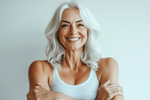 Woman in her upper 50s who appears confident in her skin, representative of a Reid Health Plastic & Reconstructive Surgery patient