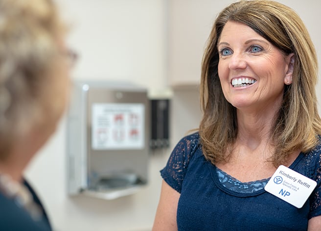 Kim Reffitt, NP at Eaton Primary and Specialty Care smiling at a patient