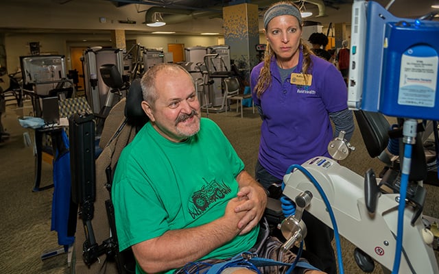 A patient participating in therapy session at Reid Rehabilitation Services