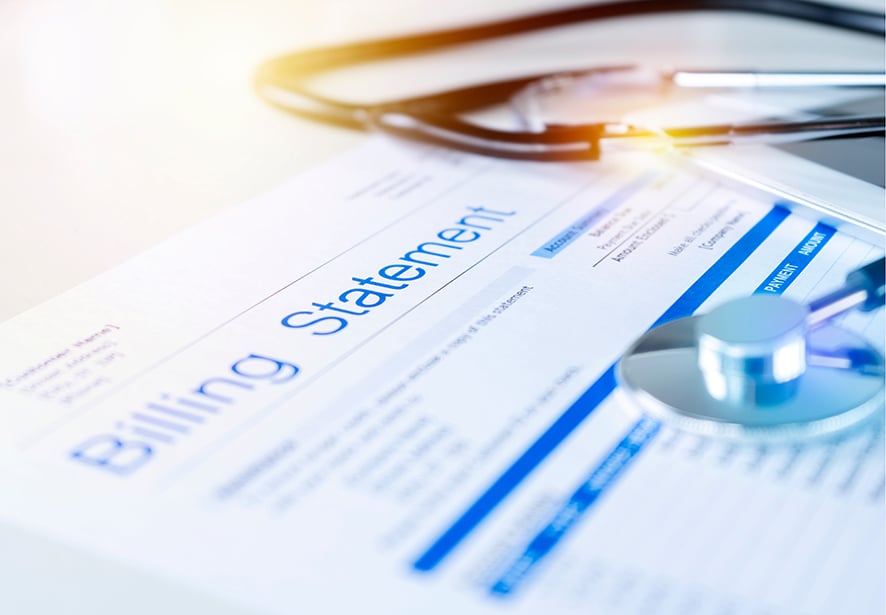 Health care billing statement with stethoscope