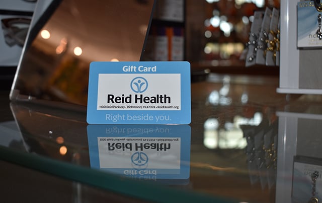 An image of a Reid Health Gift Card sitting on a counter in the Ginkgo Boutique