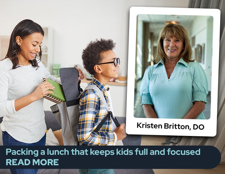 An African American mom with placing a packed lunch into her sons backpack with Reid Health's Pediatrician Kristen Britton, DO image and her name to the right side. In a dark blue box the following copy is overlayed "Packing a lunch that keeps kids full and focused Read More"
