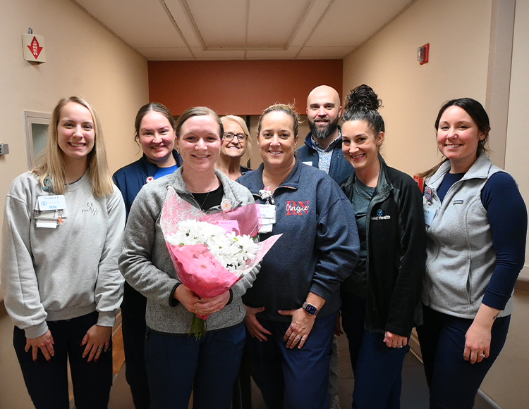 Reid Health's February 2026 Daisy winner Bailey Herrell, with other members of the Reid Health Connersville staff. 