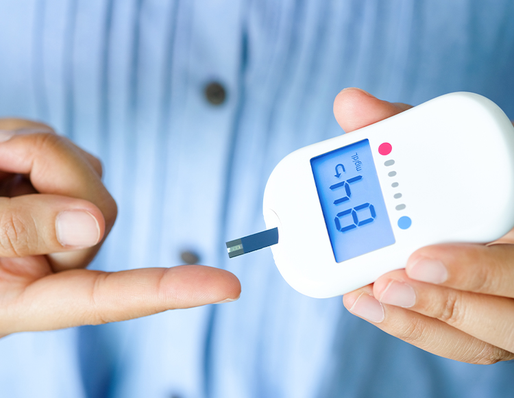 A person showing the process of the blood glucose test