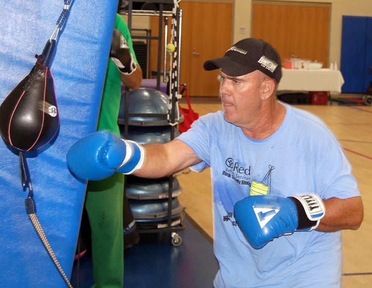 The late Doug Kuntz, working out during RockSteady boxing class