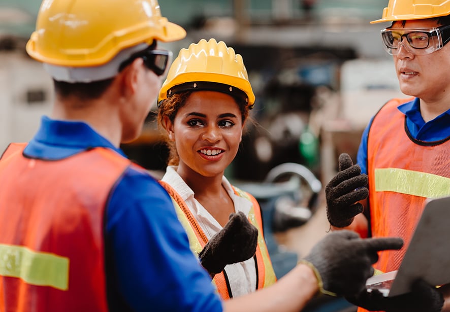 A group of workers in hard hats