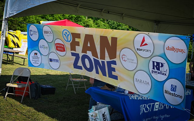 The fan zone banner from Reid Adventure Course 2025