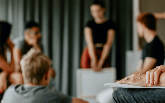 Photo is purposefully faded and unfocused to depict a confidential support group that Reid Health offers its first responders. The group is called FRESH.