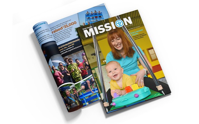 Photo is the cover of Reid's Mission Magazine cover. The cover shows an image of community members with the title of the magazine on the image.