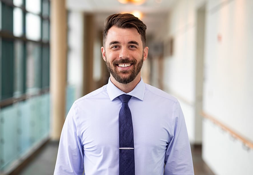 A professional headshot of Reid Health's Brandon Guth, PA
