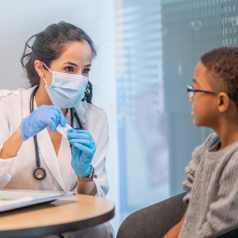 Thumbnail of a doctor and a young patient talking about oral food challenges