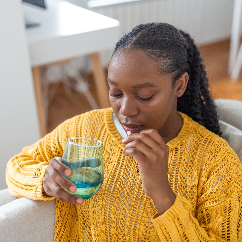 COVID19 Rebound Cases, female taking medicine