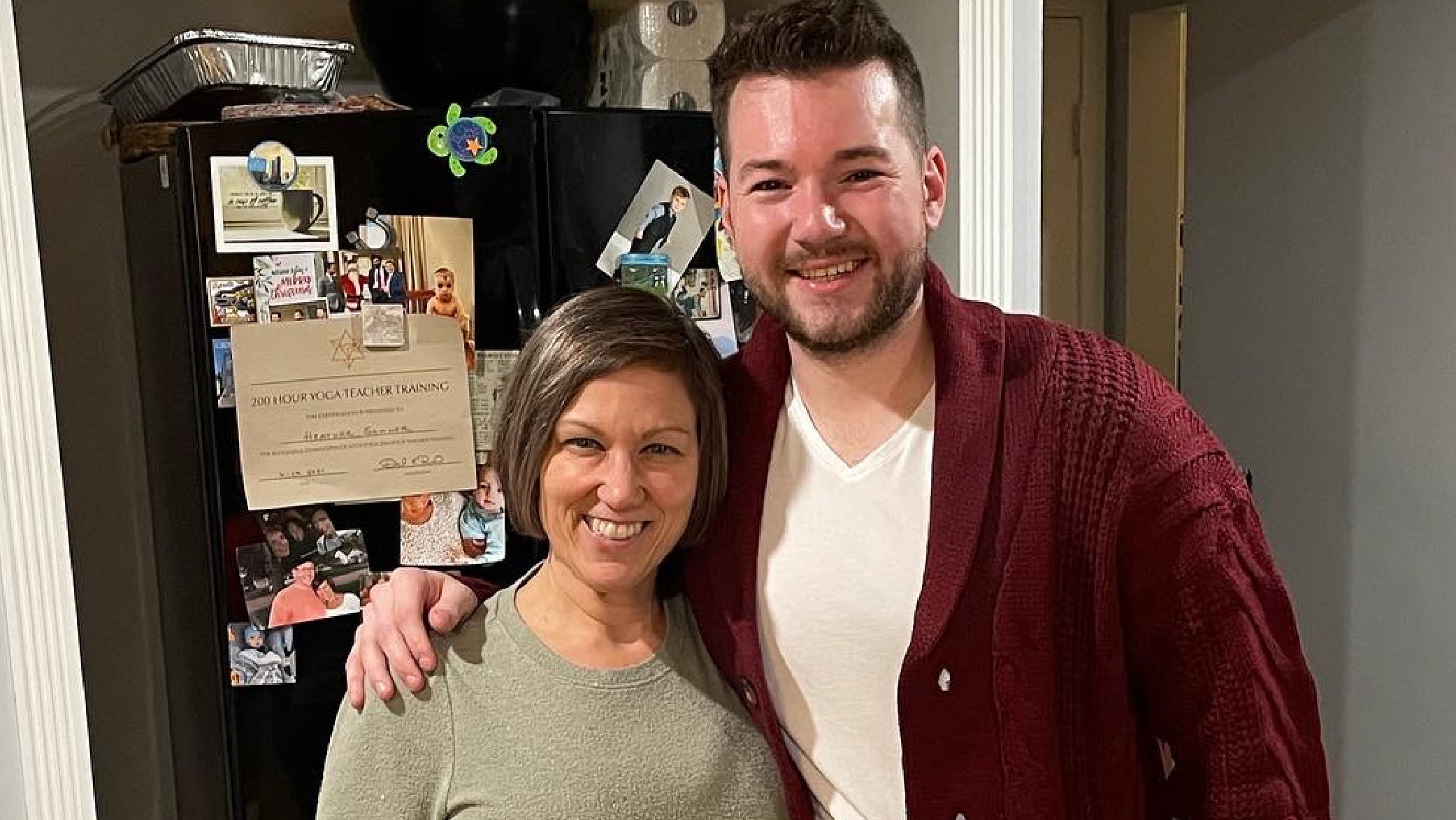 Heather Sommer smiles in her kitchen