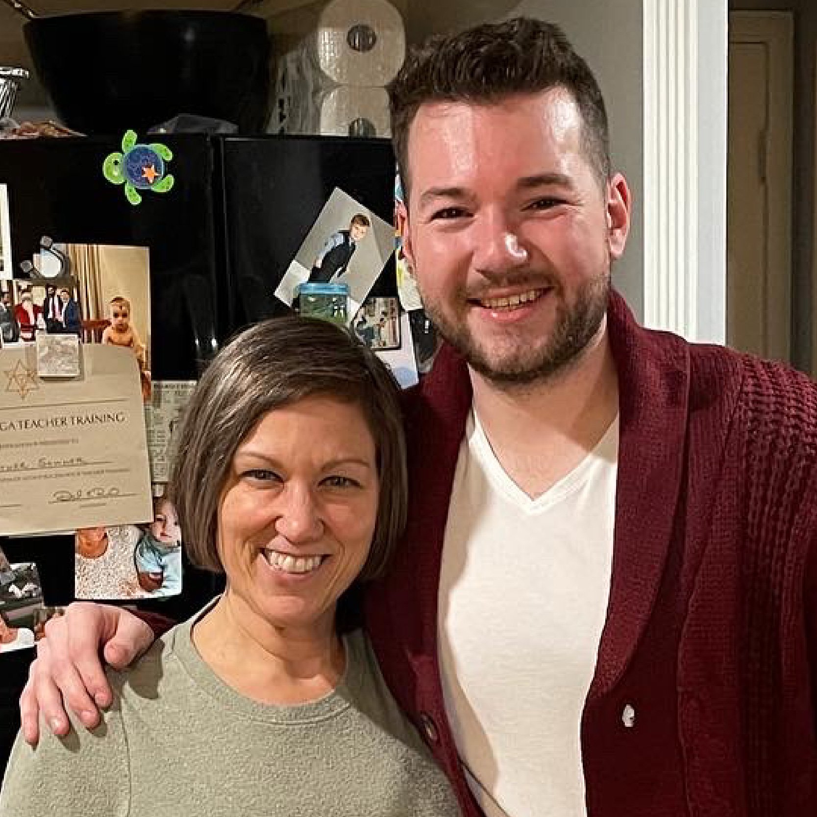 Heather Sommer smiles in her kitchen