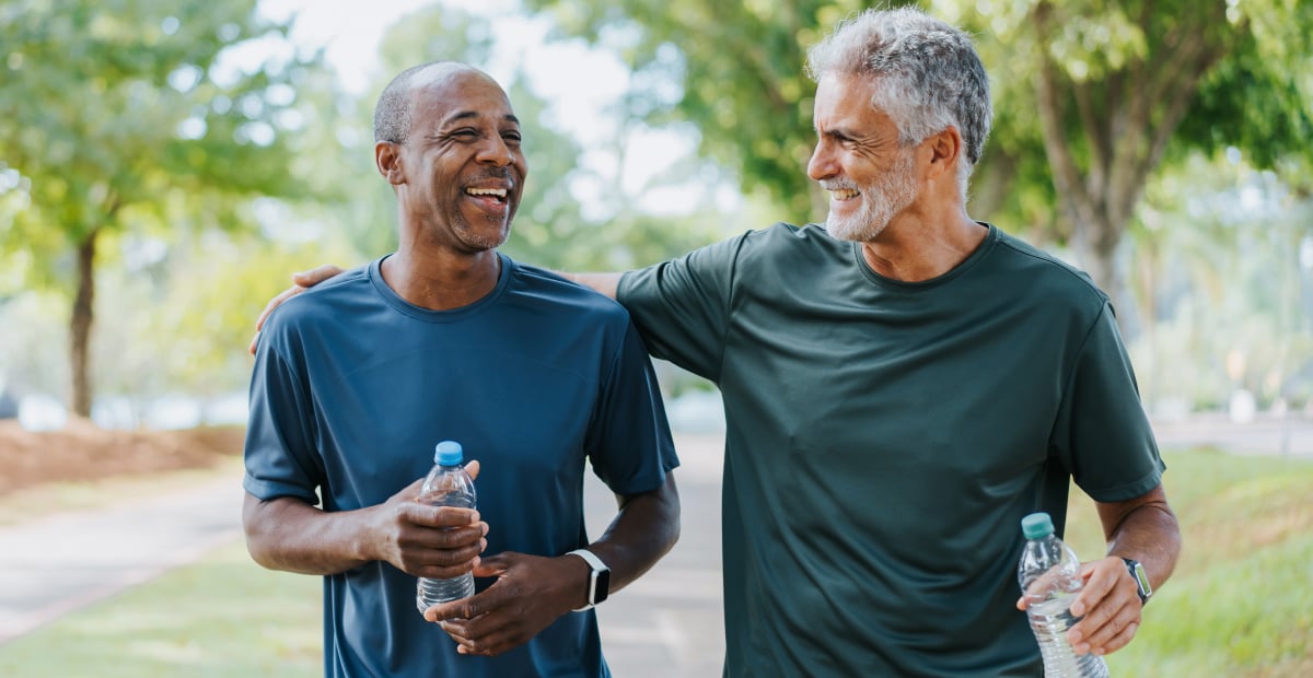 Two smiling men out for a walk
