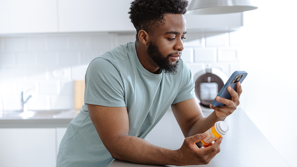 Patient looking up prescription info using AI