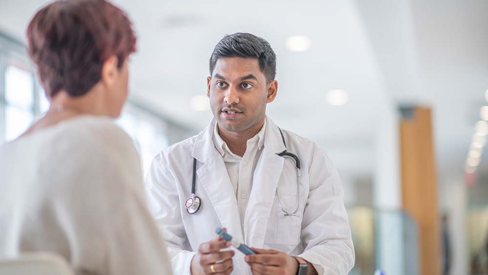 Woman with diabetes meets with male physician