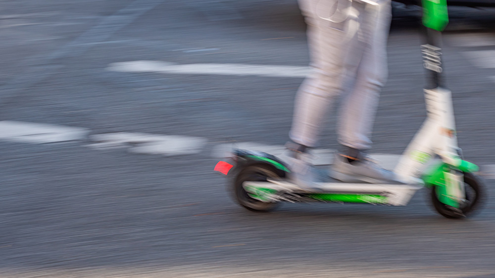 Electric scooter driving fast