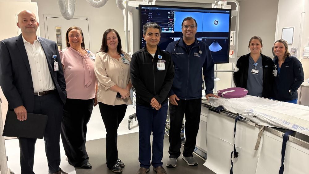 Cardiology leadership and team members in electrophysiology lab
