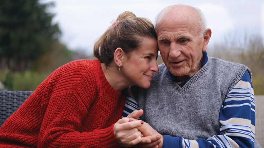 Adult woman with elderly father
