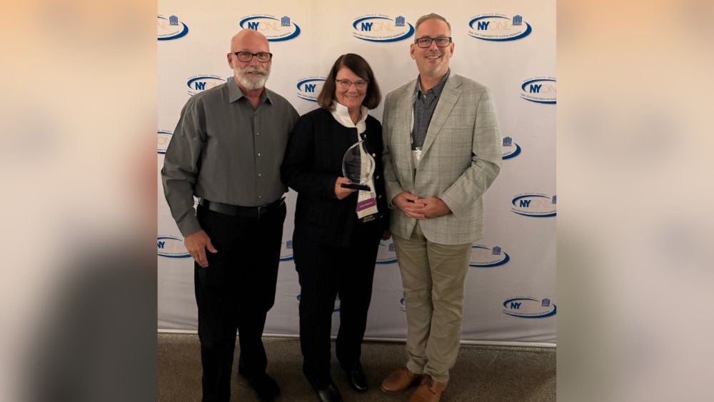 George Glessner, Dr. Theresa Glessner, and Dan Ireland