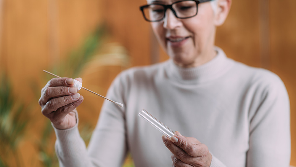 Senior Woman Doing DNA Test at Home