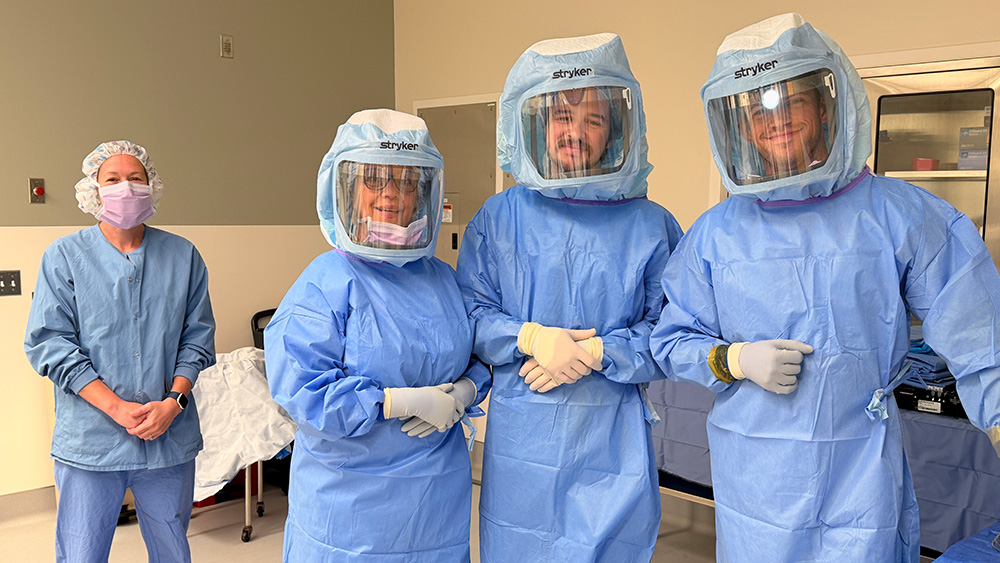 Joint replacement surgery team with Persona IQ smart knee device