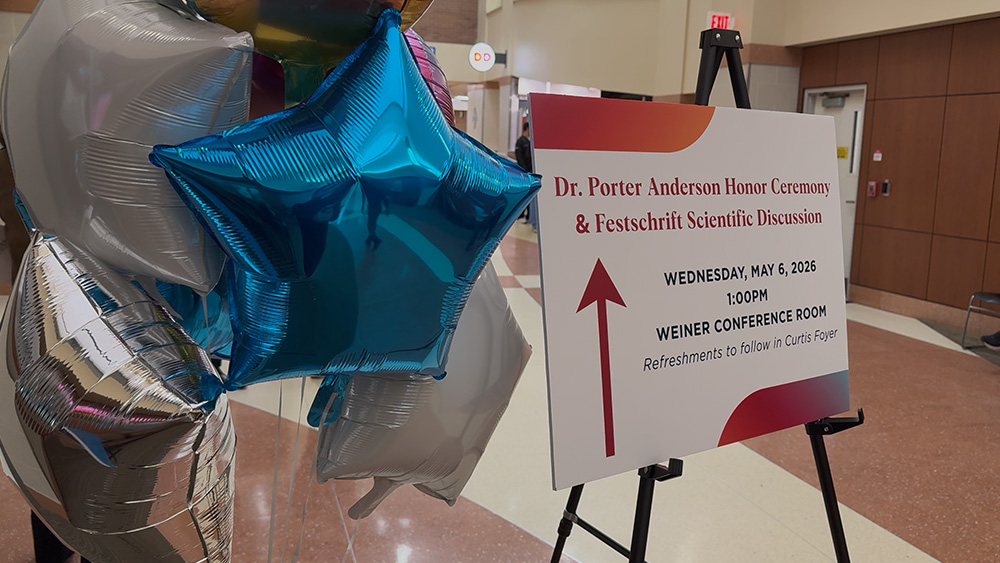 Sign and balloons outside Porter Anderson ceremony