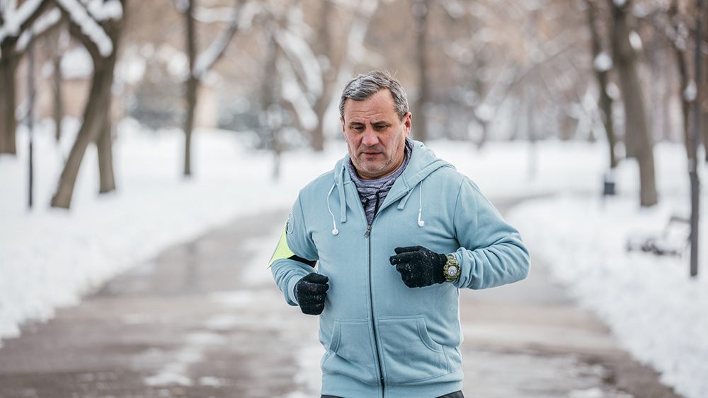 man running outside in winter