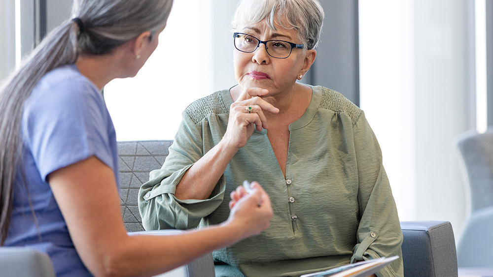 Female patient talks with female physician