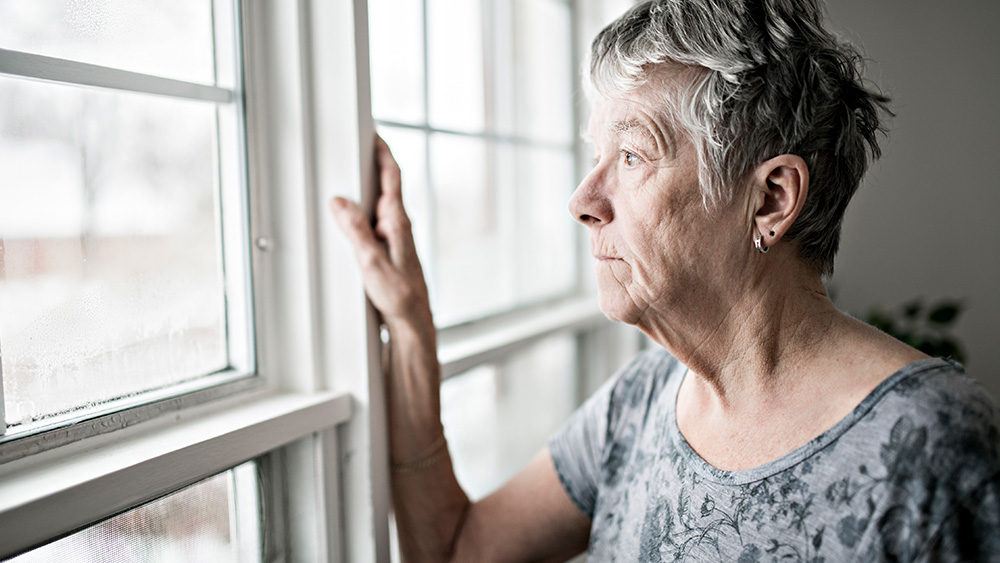 Older woman with dementia experiencing sundowning