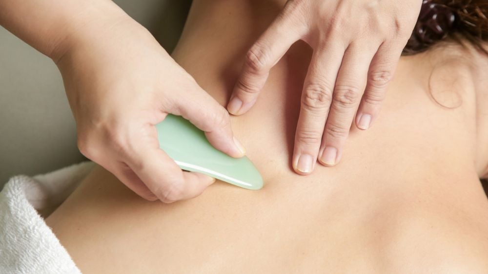Traditional Chinese Medicine gua sha stone massage