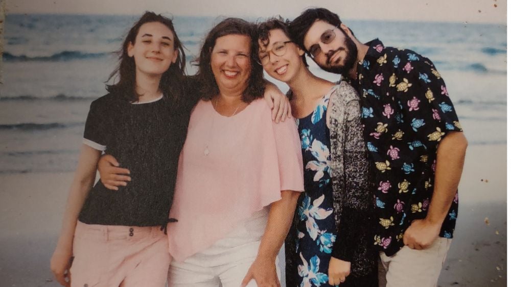 Tracey Zimmerman with her two adult daughters and son in law