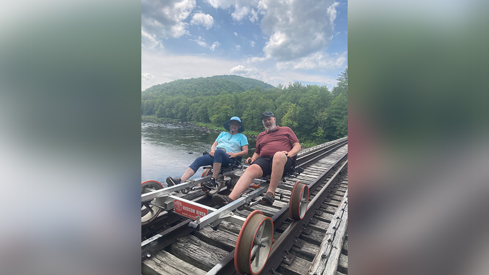 Patricia Sevier and husband on rail explorer