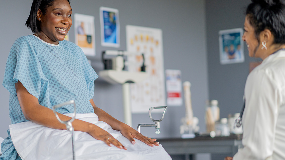 Female patient meets with urogynecologist