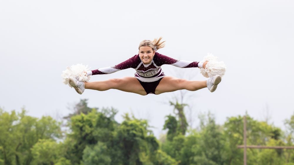 Cheerleader flying in the air