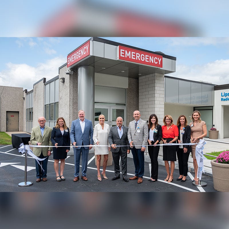 Rochester Regional Health leaders cut a ceremonial ribbon outside the Clifton Springs Hospital and Clinic Emergency Department