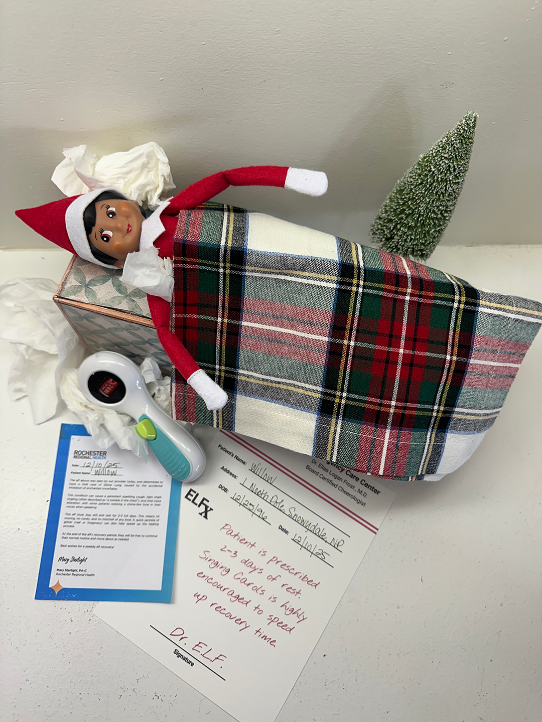 an elf-on-the-shelf resting with an illness